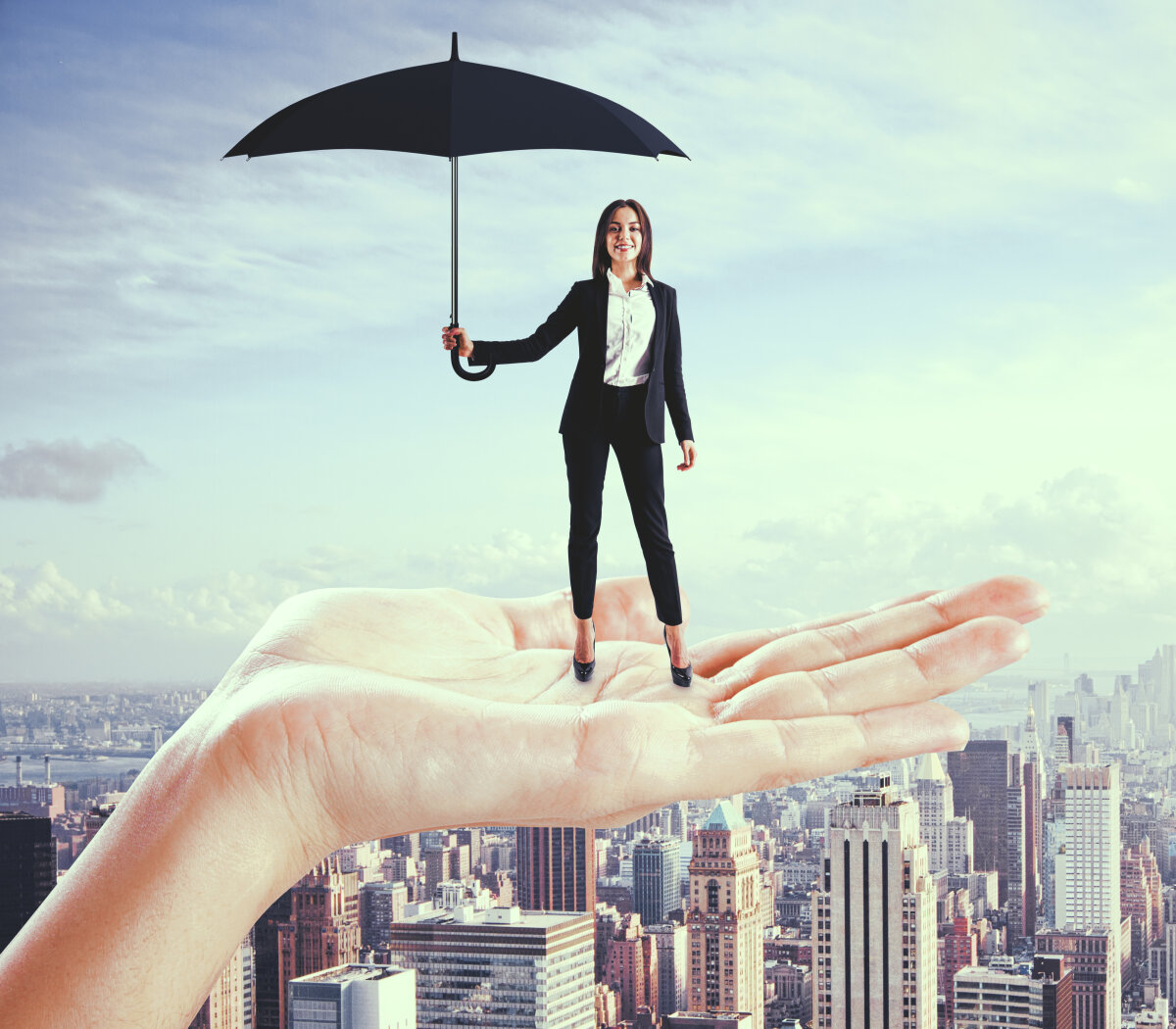 Caucasian businesswoman with umbrella