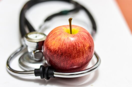 Stethoscope and apple